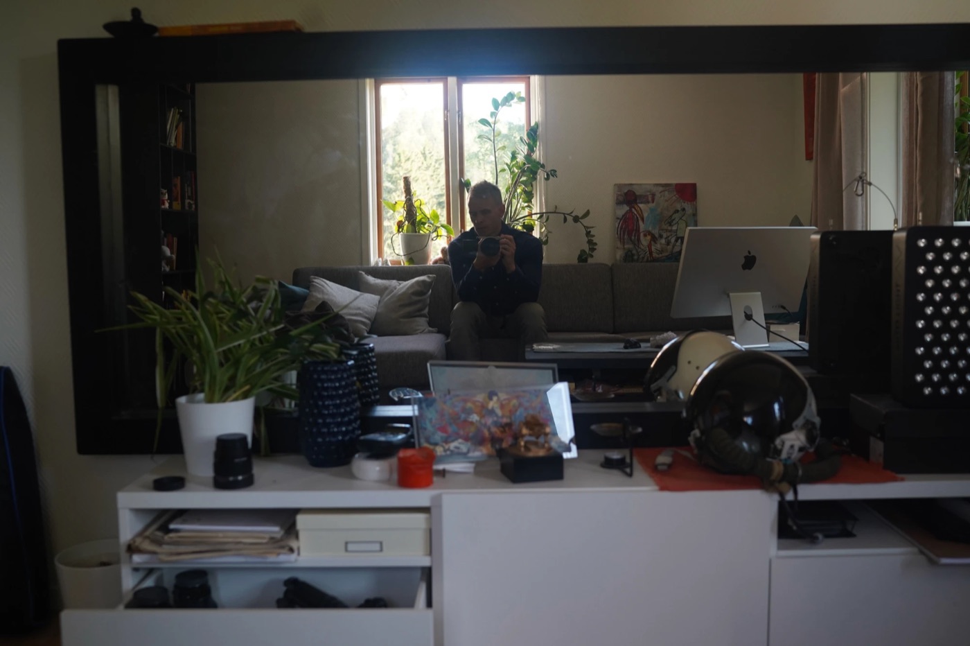 Self-portrait in a mirror with a camera